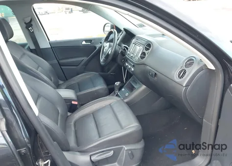 2014 Volkswagen Tiguan Sel z USA, uszkodzony, nr VIN WVGBV3AX3EW531961